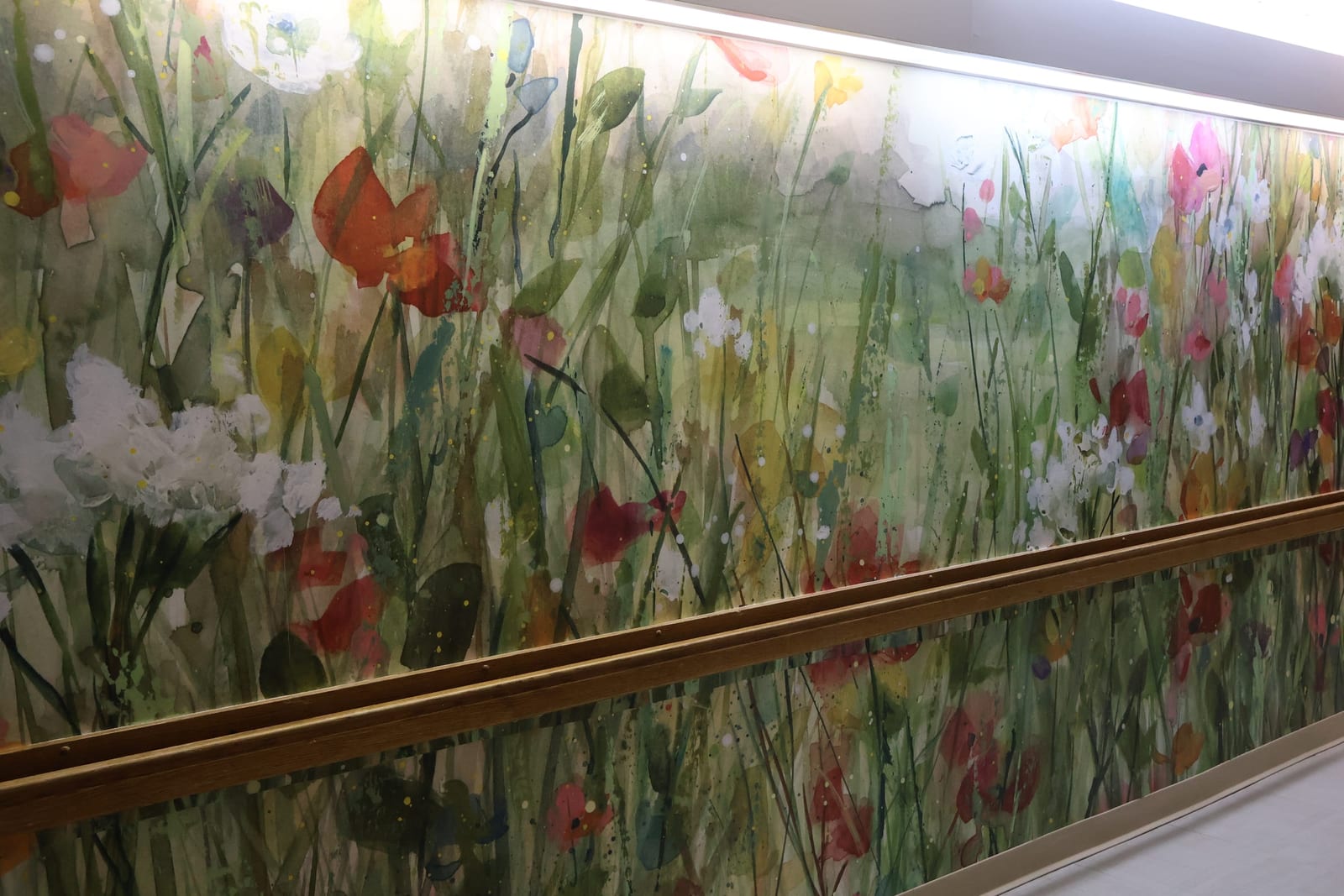 Memory care floral mural at Advinia Care Newton-Wellesley