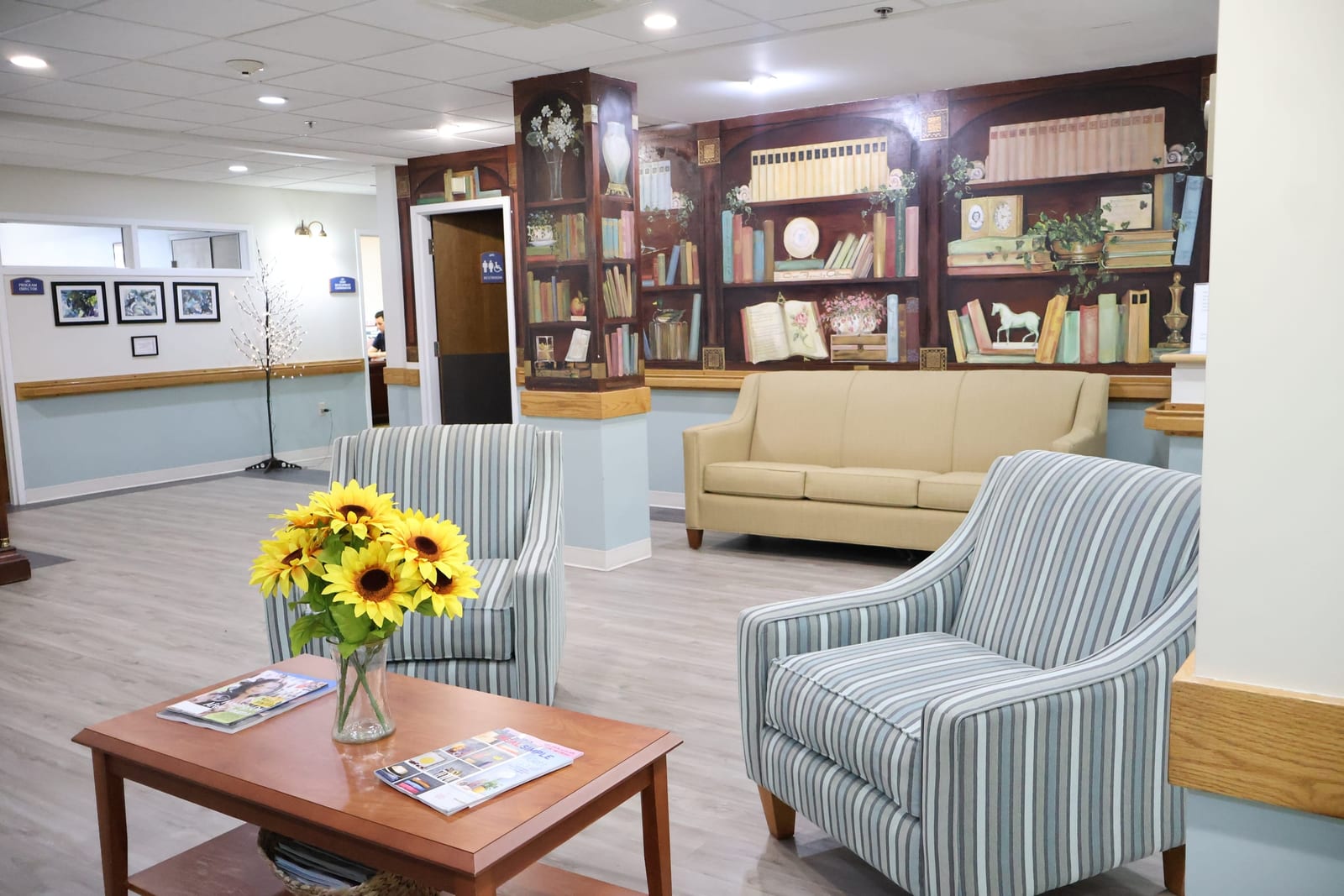 Lounge sunflowers at Advinia Care Newton-Wellesley