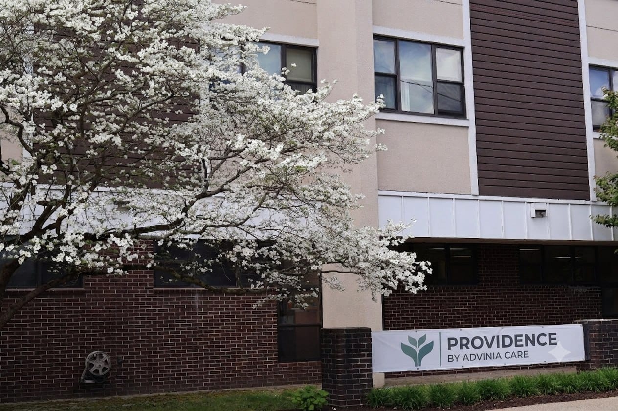 Building sign at Advinia Care Providence