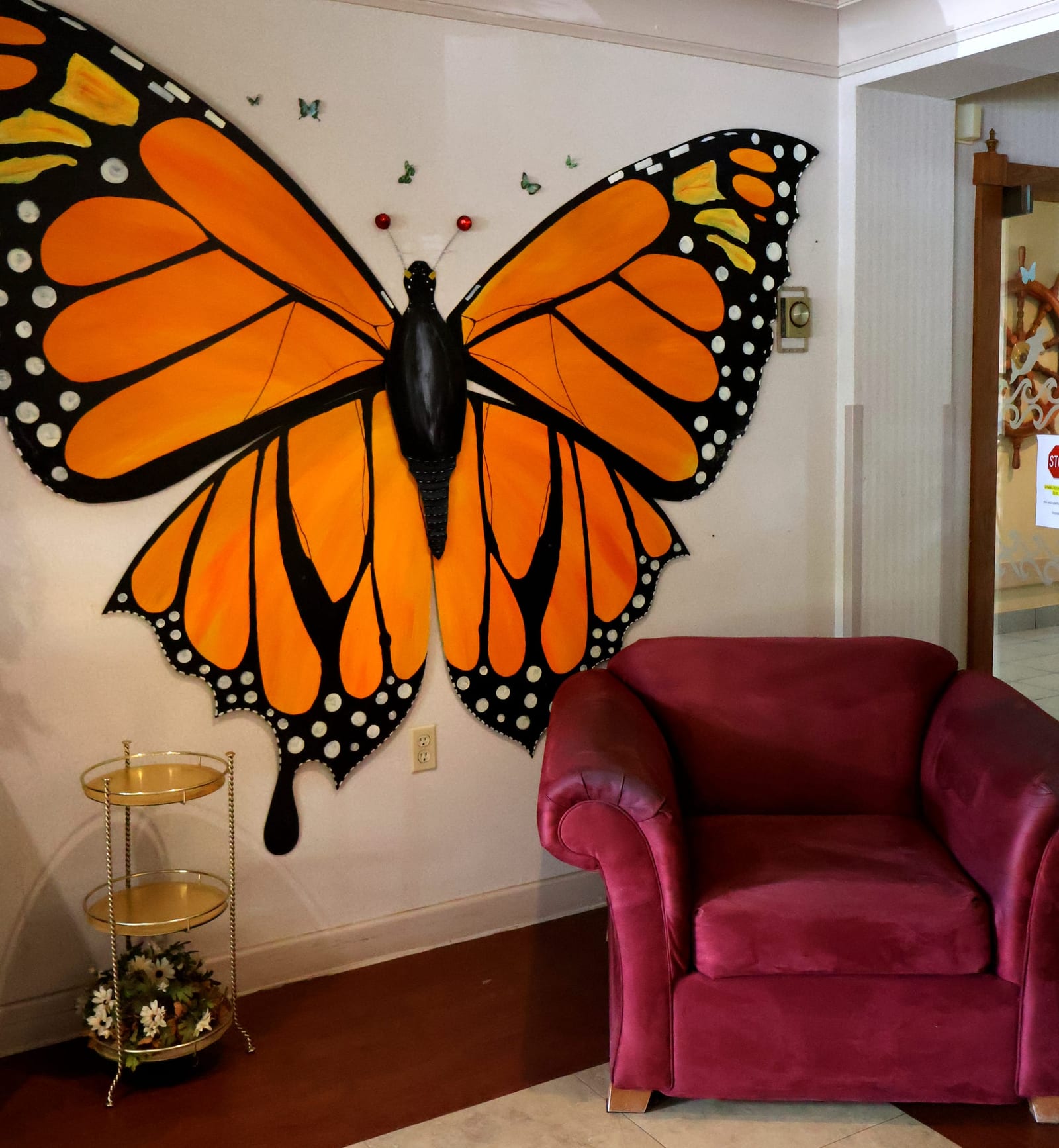 Butterfly mural lounge at Advinia Care Waterview Villa